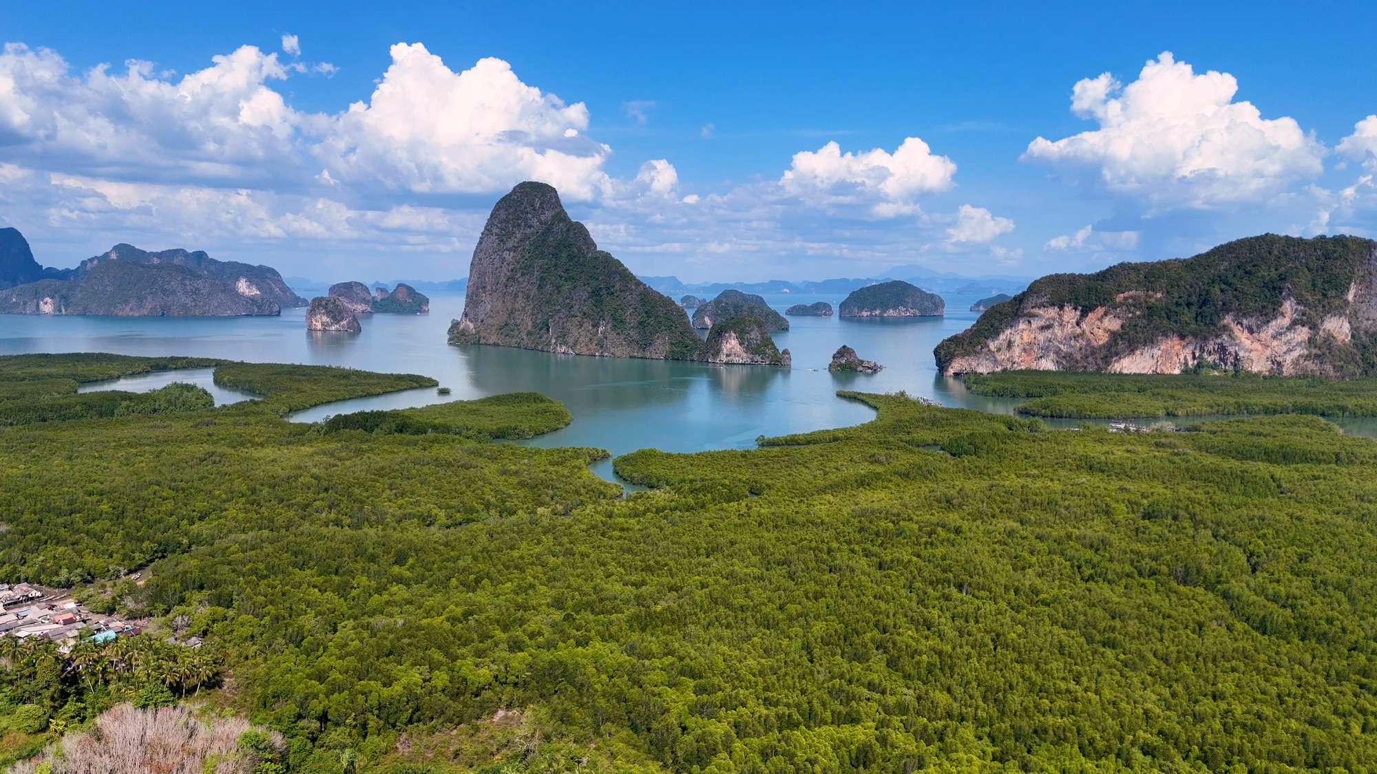 Aerial view of Phang Nga Bay's limestone formations and mangroves